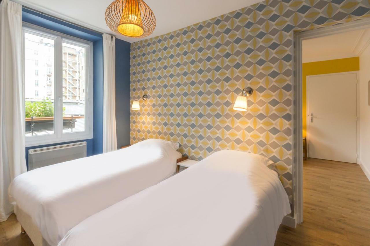 Les Toits De Paris Bed & Breakfast Bagian luar foto