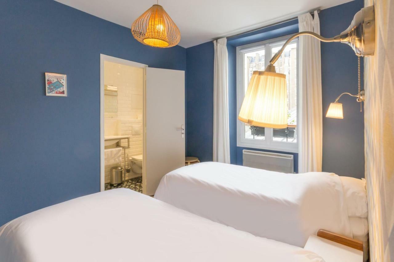 Les Toits De Paris Bed & Breakfast Bagian luar foto
