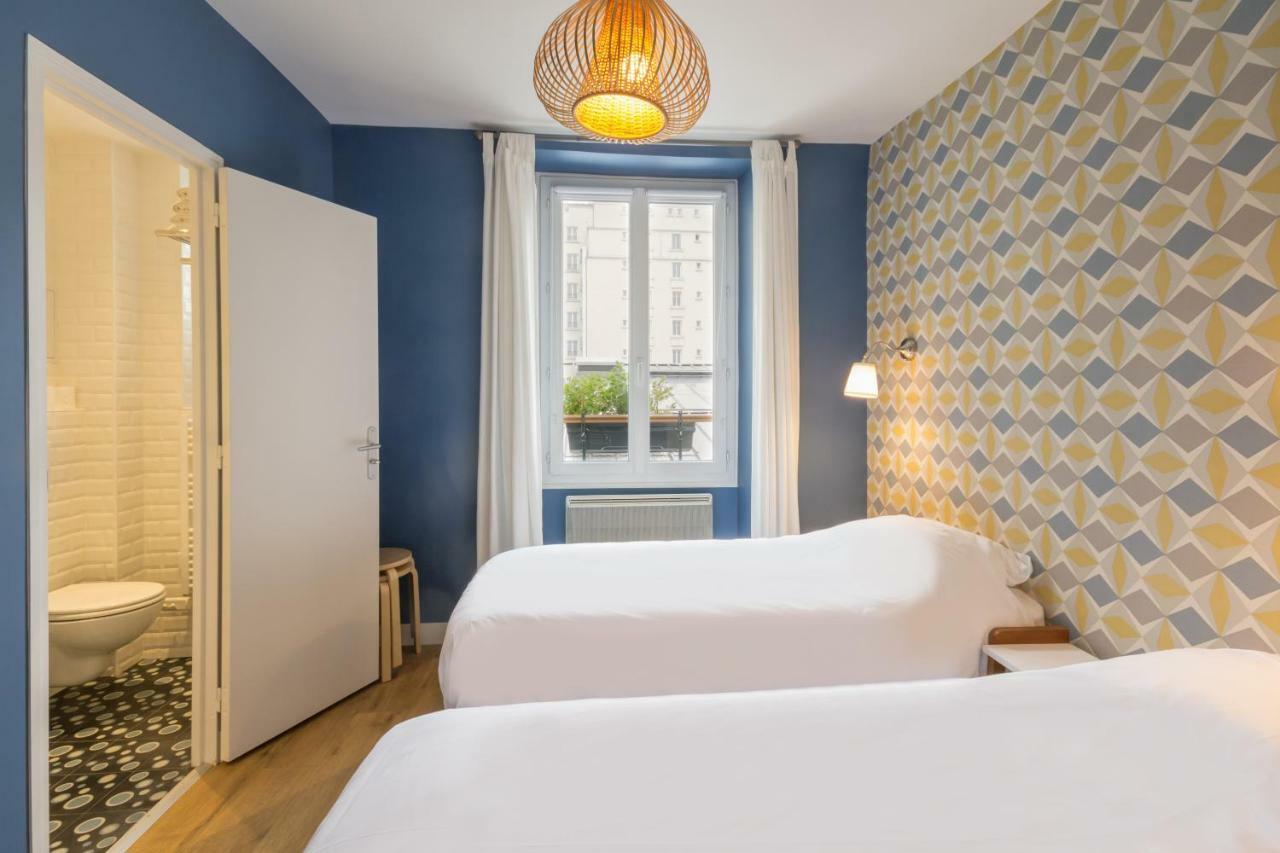 Les Toits De Paris Bed & Breakfast Bagian luar foto